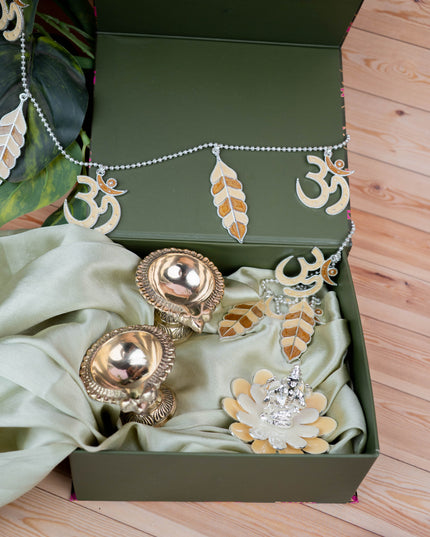 Deepavali: Pichwai Box with German Silver Ganesha Idol, Thoran, Set of 2 Brass Diya - WDC0001