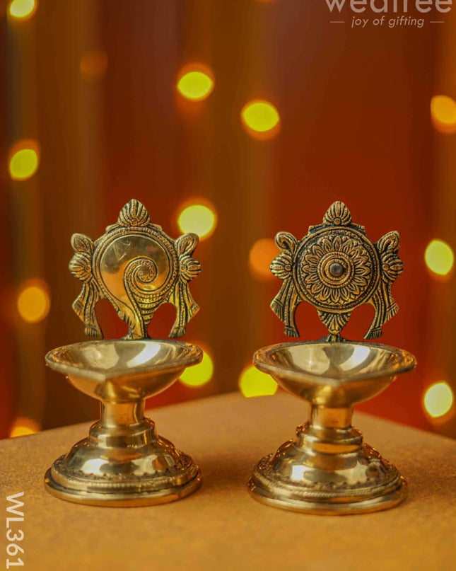 Brass Shanku Chakra Diya With Stand - Set Of 2 Wl3611