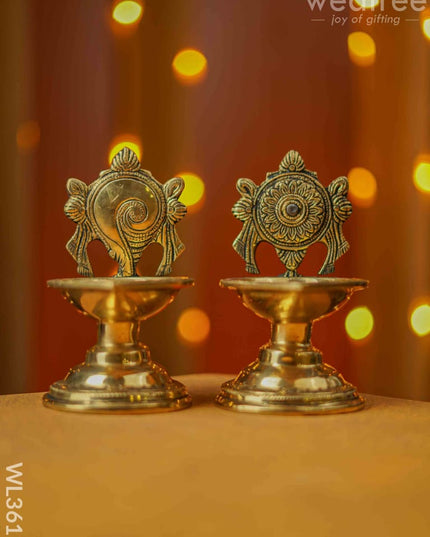 Brass Shanku Chakra Diya With Stand - Set Of 2 Wl3611
