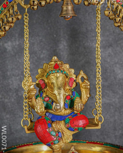 Brass Swing Ganesha Urli With Peacock Design (Green & Red Stones) - Wl0071-1