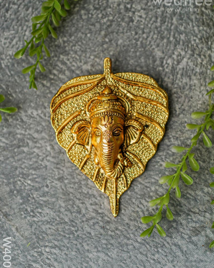 White Metal Leaf Ganesha Face - Gold Finish W4006 Divine Figurines
