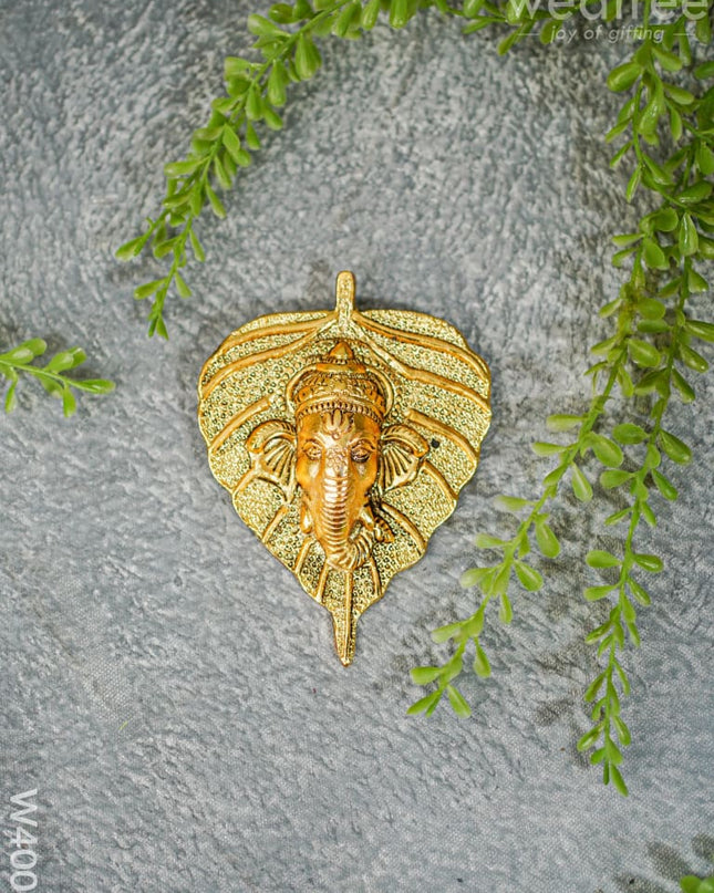 White Metal Leaf Ganesha Face - Gold Finish W4006 Divine Figurines