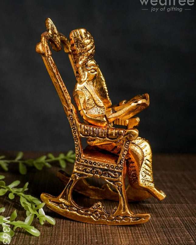 White Metal Ganesha On Chair Gold Finish - W3631 Metal