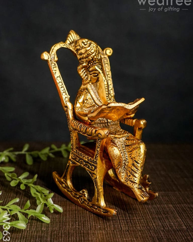 White Metal Ganesha On Chair Gold Finish - W3631 Metal