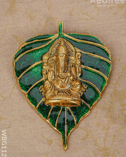 White Metal Green Leaf Ganesha Wall Hanging - Wbg1124 Divine Figurines