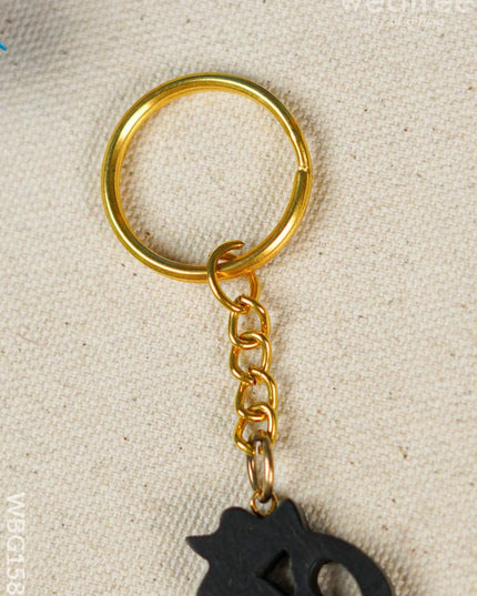 Karungali Om Keychain - Wbg1582 Keychains & Sockets