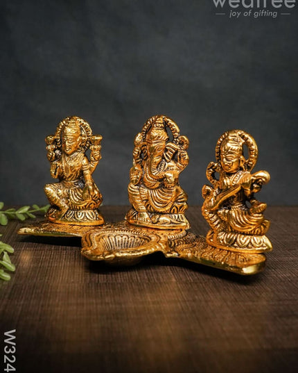 White Metal Lakshmi Ganesha Saraswati Diya - W3241