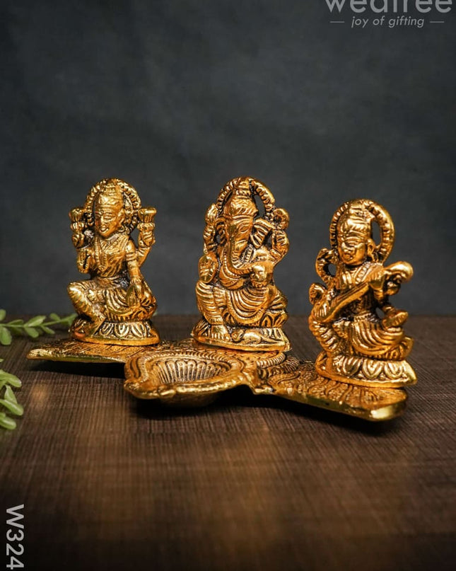 White Metal Lakshmi Ganesha Saraswati Diya - W3241