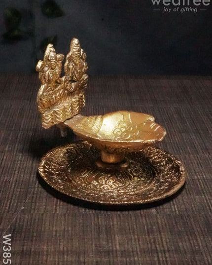 White Metal Oxidised Lakshmi Ganesh Hand Diya Gold Finish - W3858 Diyas