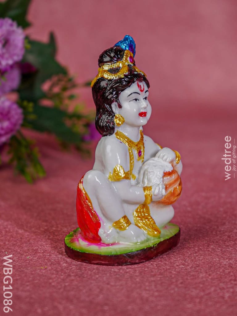 Polyresin Butter Krishna Idol - Wbg1086 Home Decors