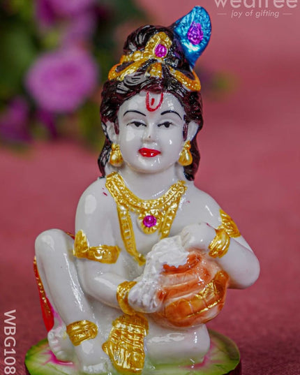 Polyresin Butter Krishna Idol - Wbg1086 Home Decors