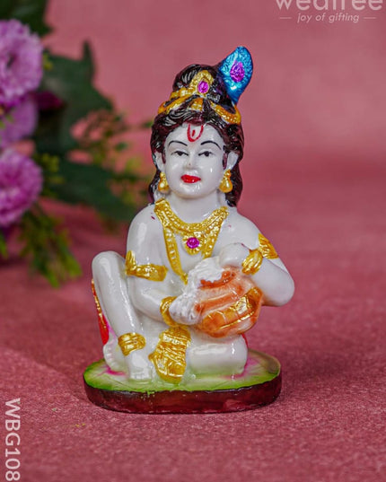 Polyresin Butter Krishna Idol - Wbg1086 Home Decors