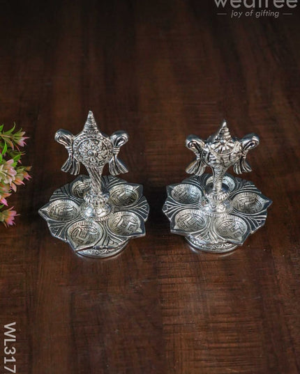 White Metal Shanku Chakra 5 Face Diya - Set Of 2 Wl3172