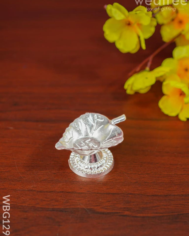 Zinc Alloy Swastik Diya In Leaf Shape - Wbg1294 Diyas