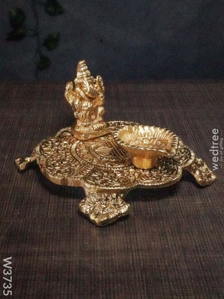 White Metal Chowki Ganesh With Diya Gold Finish - W3735 Diyas