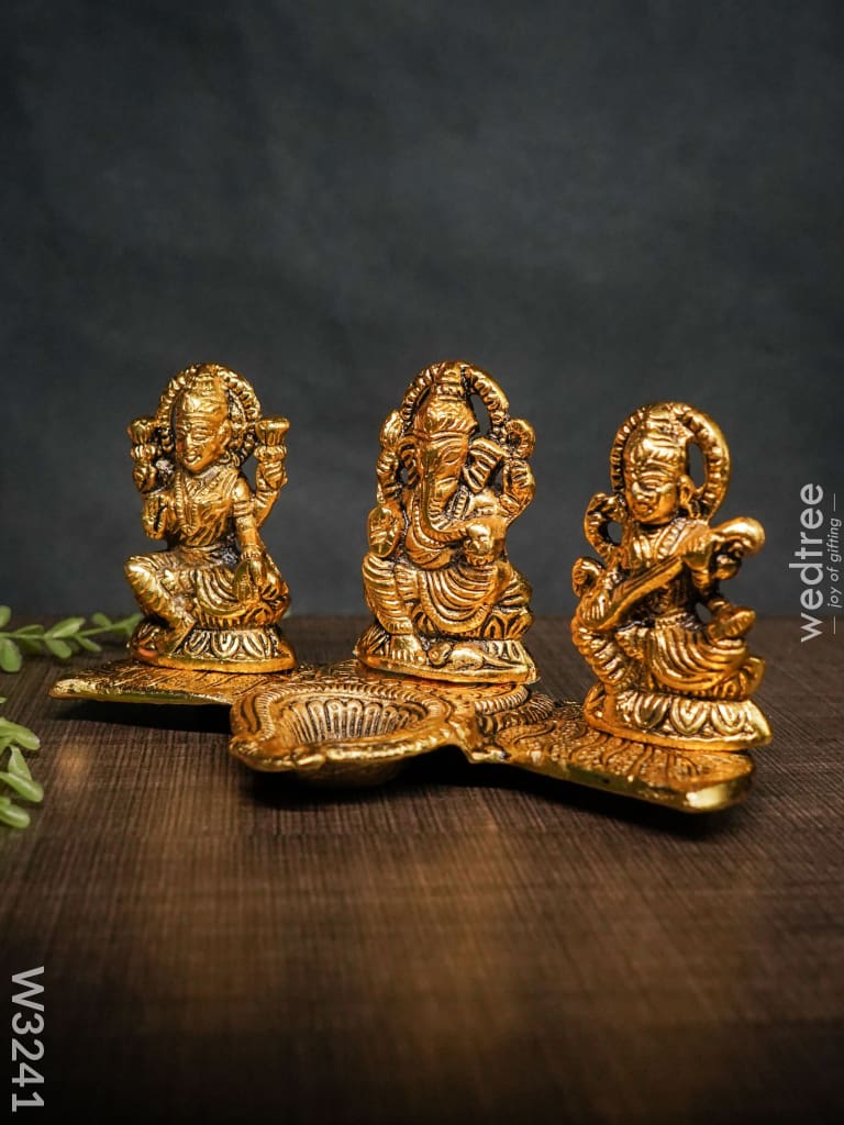 White Metal Lakshmi Ganesha Saraswati Diya - W3241