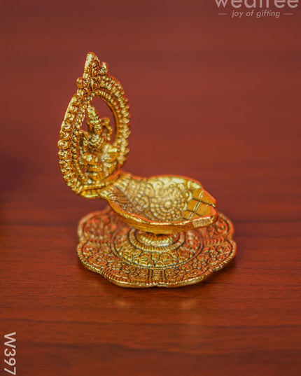 White Metal Lakshmi Hand Diya With Gold Finish - W3975 Diyas