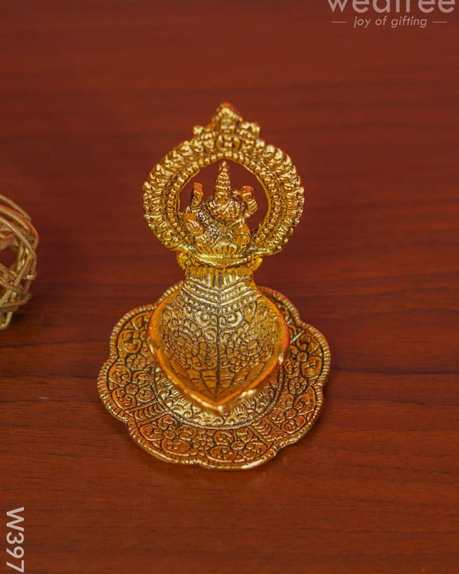 White Metal Lakshmi Hand Diya With Gold Finish - W3975 Diyas