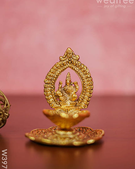 White Metal Lakshmi Hand Diya With Gold Finish - W3975 Diyas