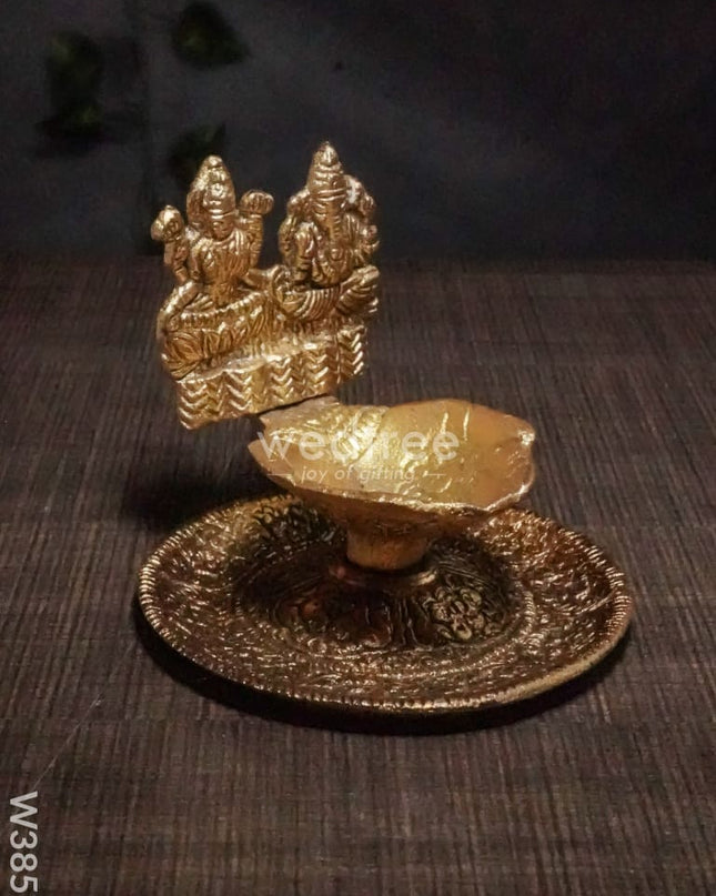 White Metal Oxidised Lakshmi Ganesh Hand Diya Gold Finish - W3858 Diyas