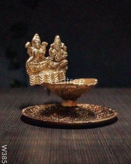 White Metal Oxidised Lakshmi Ganesh Hand Diya Gold Finish - W3858 Diyas