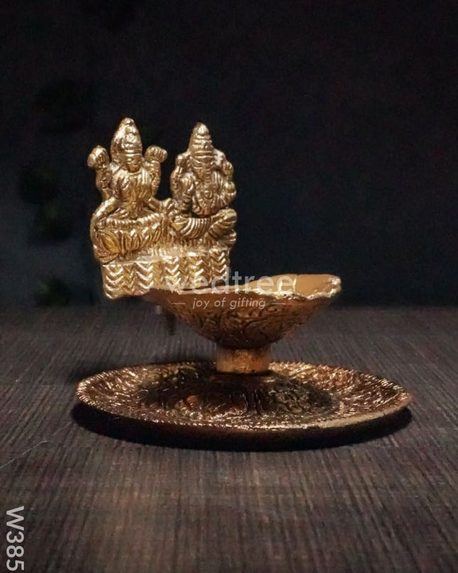 White Metal Oxidised Lakshmi Ganesh Hand Diya Gold Finish - W3858 Diyas