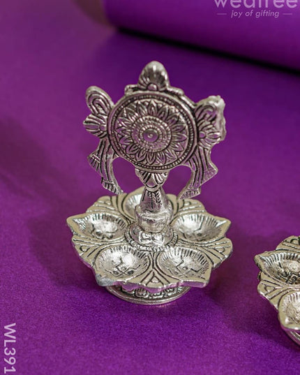 White Metal Shanku Chakra Diya - Wl3918