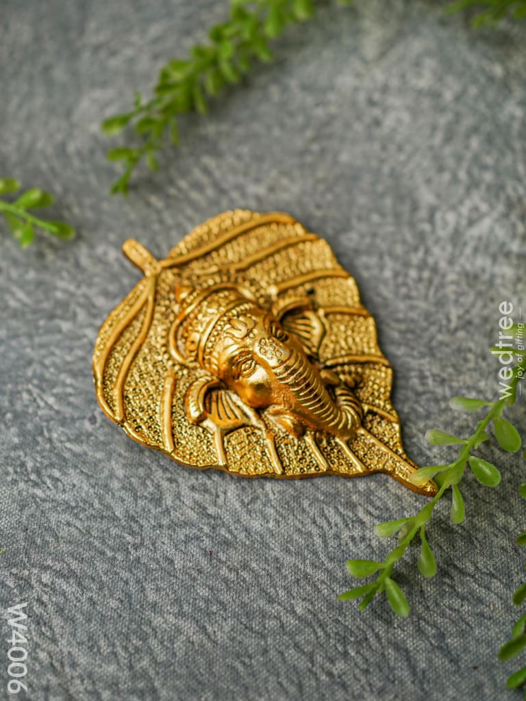 White Metal Leaf Ganesha Face - Gold Finish W4006 Divine Figurines